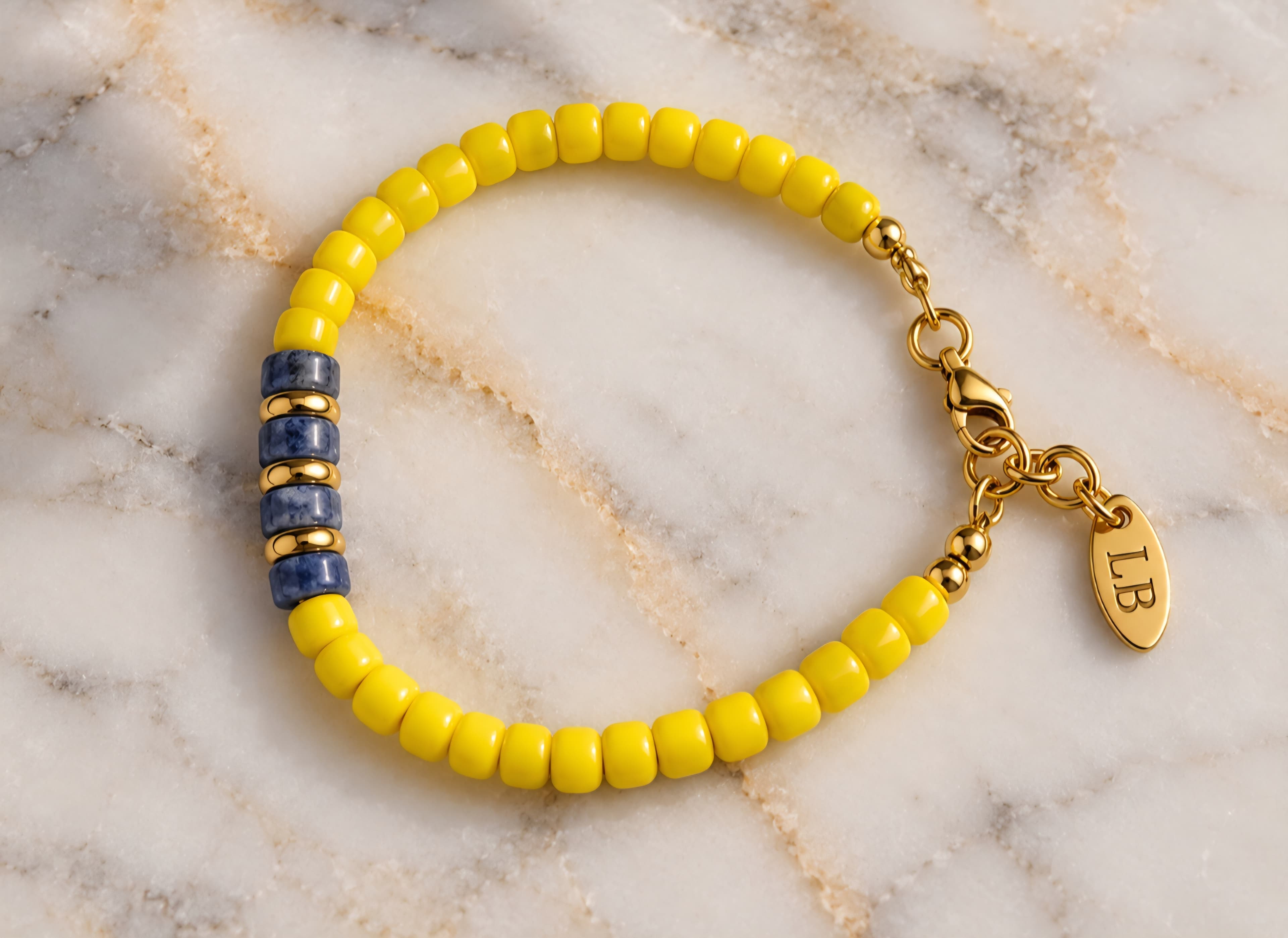 gele rocaille met blauwe edelsteen 2